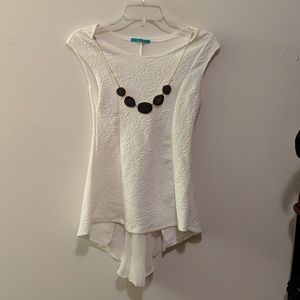 White sleeveless peplum top
